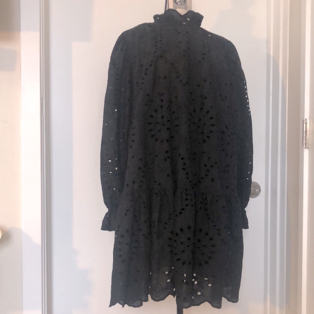 Black eyelet dress. Great for any occasion. Worn twice. Excellent quality.